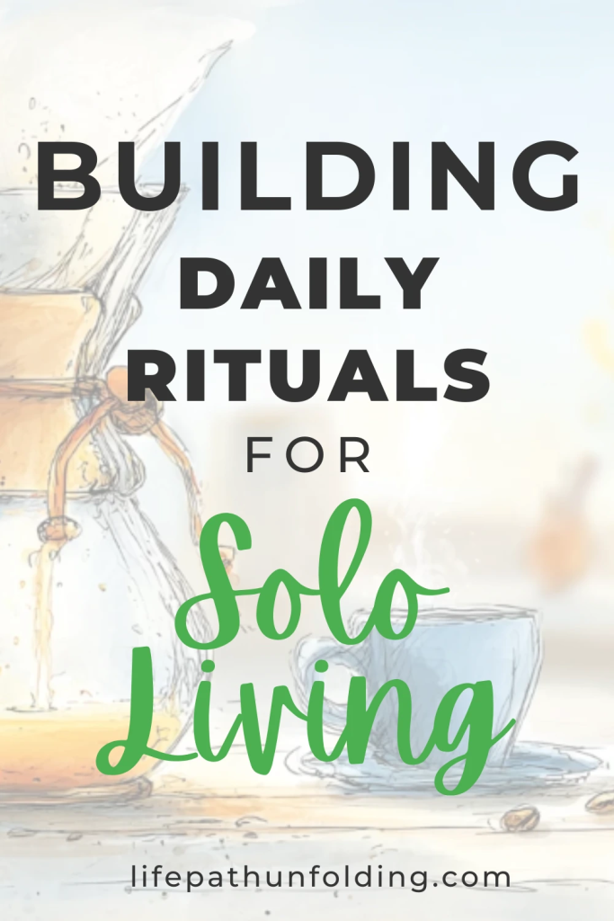 Pinterest pin with the text “Building Daily Rituals for Solo Living” over a softly illustrated background of a morning coffee scene. The image shows a pour-over coffee maker dripping into a glass carafe and a steaming blue cup on a table, evoking warmth and peaceful routine. Website "lifepathunfolding.com" appears at the bottom.