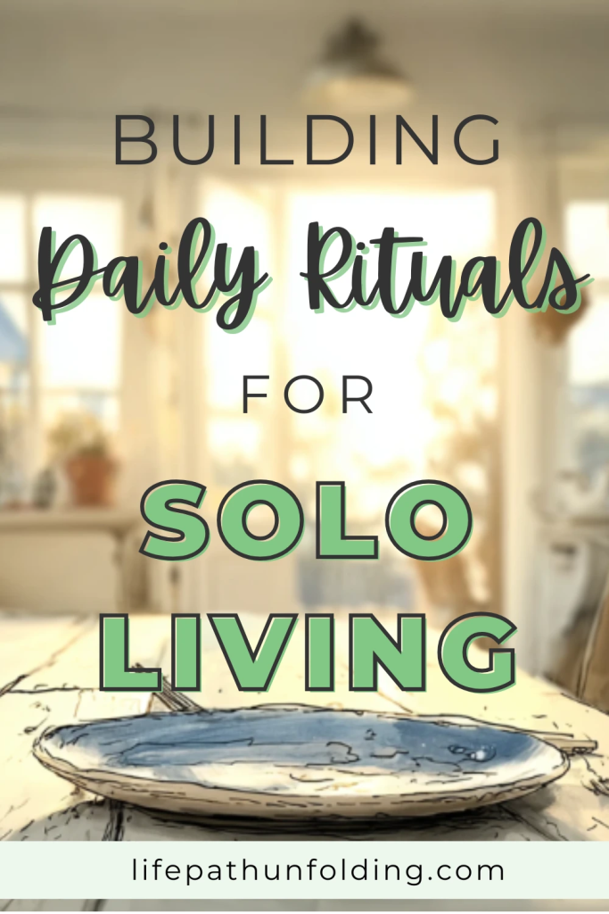 Pinterest pin with the text “Building Daily Rituals for Solo Living” over a softly lit image of an empty plate and utensils on a rustic wooden table. The background shows a cozy, sunlit kitchen, suggesting the warmth and intention of daily rituals in solo living. Website "lifepathunfolding.com" is noted at the bottom.